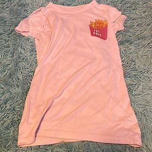 I’m selling a tee shirt that is good for girl around the age of 8 years old.